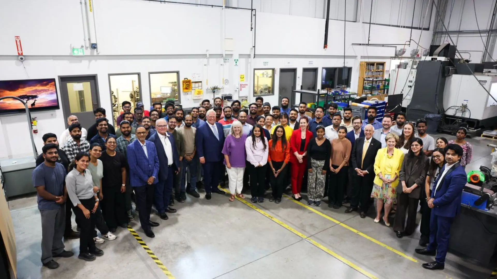 Photo of attendees at TICP announcement with Doug Ford